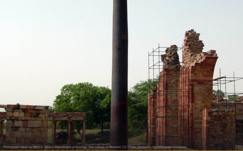 The iron pillar in the Qutb complex near Delhi, India. — related to Ancient Advanced Technology Cover-Up