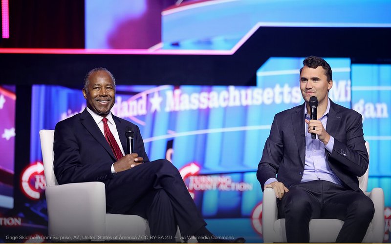 Former Secretary of Housing and Urban Development Ben Carson and Charlie Kirk speaking with attendees at The People's Convention at Huntington Place in Detroit, Michigan. — related to Alleged Charlie Kirk Assassination Plot (2024)