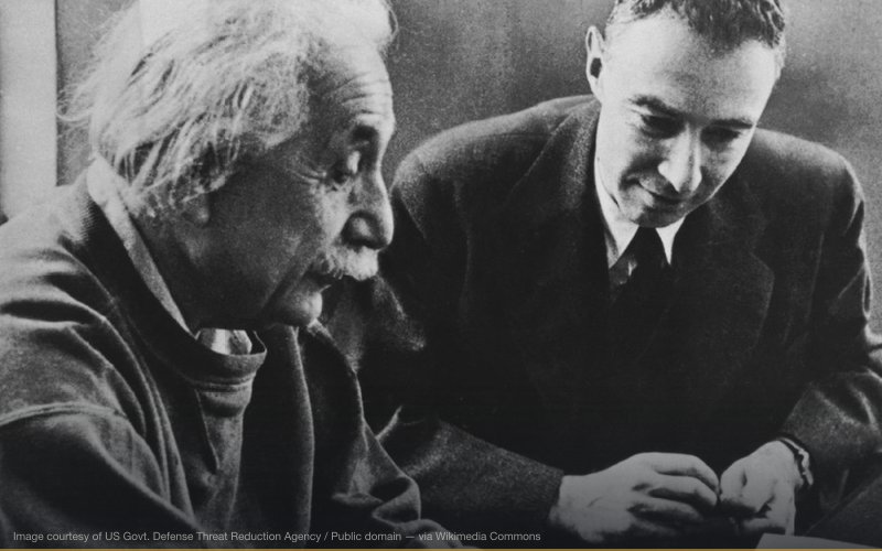 Albert Einstein and Robert Oppenheimer in a posed photograph at the Institute for Advanced Study. — related to Manhattan Project Planned at Bohemian Grove