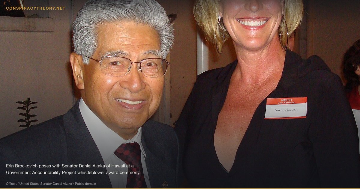 Chloramine Water Treatment Conspiracy (2004) — Erin Brockovich poses with Senator Daniel Akaka of Hawaii at a Government Accountability Project whistleblower award ceremony.