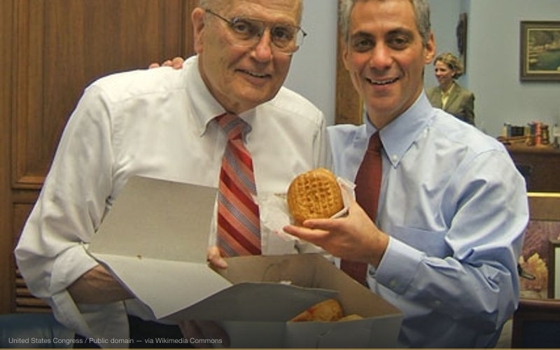 Rep. John Dingell (MI) (left) & Rep. Rahm Emanuel (IL) (right) celebrate Paczki Day, February 28, 2006 — related to Pharma Lobbying to Block Drug Reimportation