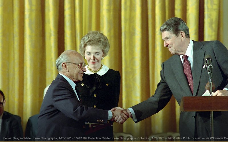 President Ronald Reagan and Nancy Reagan in The East Room Congratulating Milton Friedman Receiving The Presidential Medal of Freedom, 10/17/1988 — related to Federal Reserve Dollar Debasement / Inflation Tax