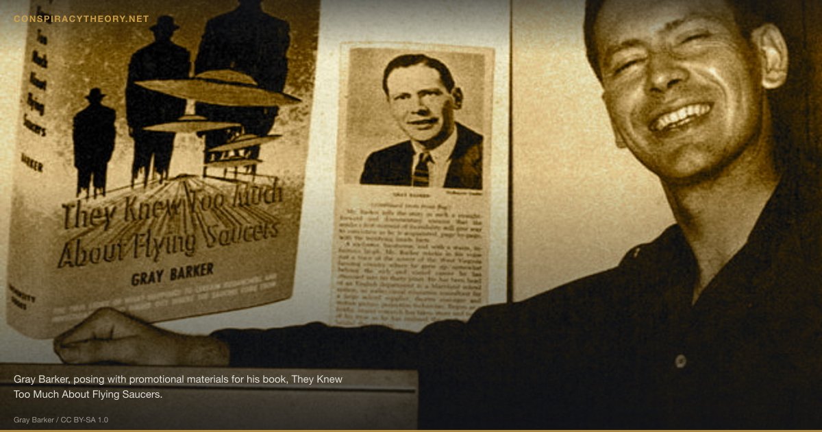 Men in Black — UFO Witness Silencing Agents (1947) — Gray Barker, posing with promotional materials for his book, They Knew Too Much About Flying Saucers.