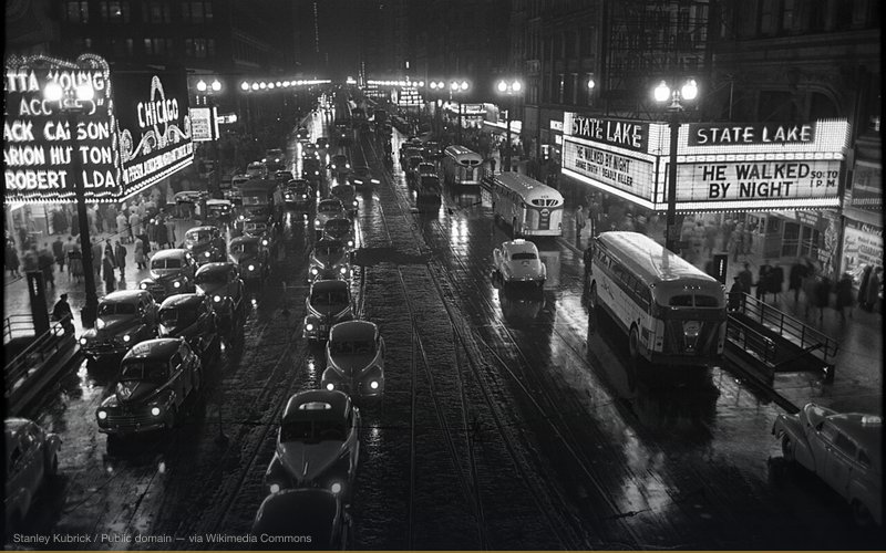 Photograph of a Chicago streetscape at night in 1949 taken for Look (American magazine), from w:State/Lake station The film w:He Walked by Night (1948) is playing at the w:State-Lake Theater 190 North State Street The film w:The Accused (1949 film) is playing at the w:Chicago Theater 175 North State Street. w:State/Lake station w:Lake station (CTA) w:Chicago Loop related - File:Stanley Kubrick - Chicago Theatre cph.3d02346.jpg = People arriving at a Chicago theater for show starring, in person, w:Jack Carson, w:Marion Hutton, and w:Robert Alda — related to Apollo Moon Landing Hoax