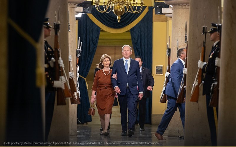 Former president George W. Bush and former first lady Laura Bush make their way to the Capitol Rotunda to attend the 60th Presidential Inauguration at the U.S. Capitol, Washington, D.C., Jan. 20, 2025. This is only the second time in history that the presidential inauguration has been held indoors due to weather. (DoD photo by Mass Communication Specialist 1st Class Vanessa White) — related to Niger Uranium Forgeries & Iraq WMD