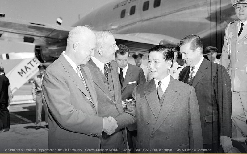 U.S. President Dwight D. Eisenhower and Secretary of State John Foster Dulles (from left) greet South Vietnamese President Ngo Dinh Diem at Washington National Airport. 05/08/1957 ARC Identifier: 542189 Item from Record Group 342: Records of U.S. Air Force Commands, Activities, and Organizations, 1900 - 2000 Part of Series: Black and White Photographs of U.S. Air Force and Predecessors' Activities, Facilities, and Personnel, Domestic and Foreign, 1930 - 1975 — related to Pentagon Papers — Government Vietnam Deception