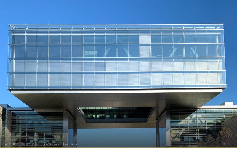 This is the entrance to the campus known as the "Floating Cube" — related to Renewable Energy Patent Buyouts by Fossil Fuel Industry