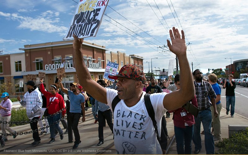 St. Paul, Minnesota September 20, 2015 Around 100 protesters blocked the light rail line in St. Paul to protest the treatment of Marcus Abrams by St. Paul police. Abrams, who is 17 and has Autism, was violently arrested by Metro Transit Police on August 31, 2015. During his arrest he suffered a split lip and multiple seizures. 2015-09-20 This is licensed under a Creative Commons Attribution License. Give attribution to: Fibonacci Blue — related to Confederate Statue Removal as History Erasure