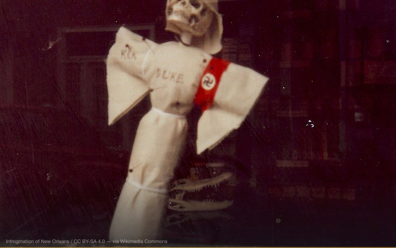Shop window in New Orleans with message against neo-Nazi Klansman David Duke, then running for Governor of Louisiana. — related to White Genocide Conspiracy Theory